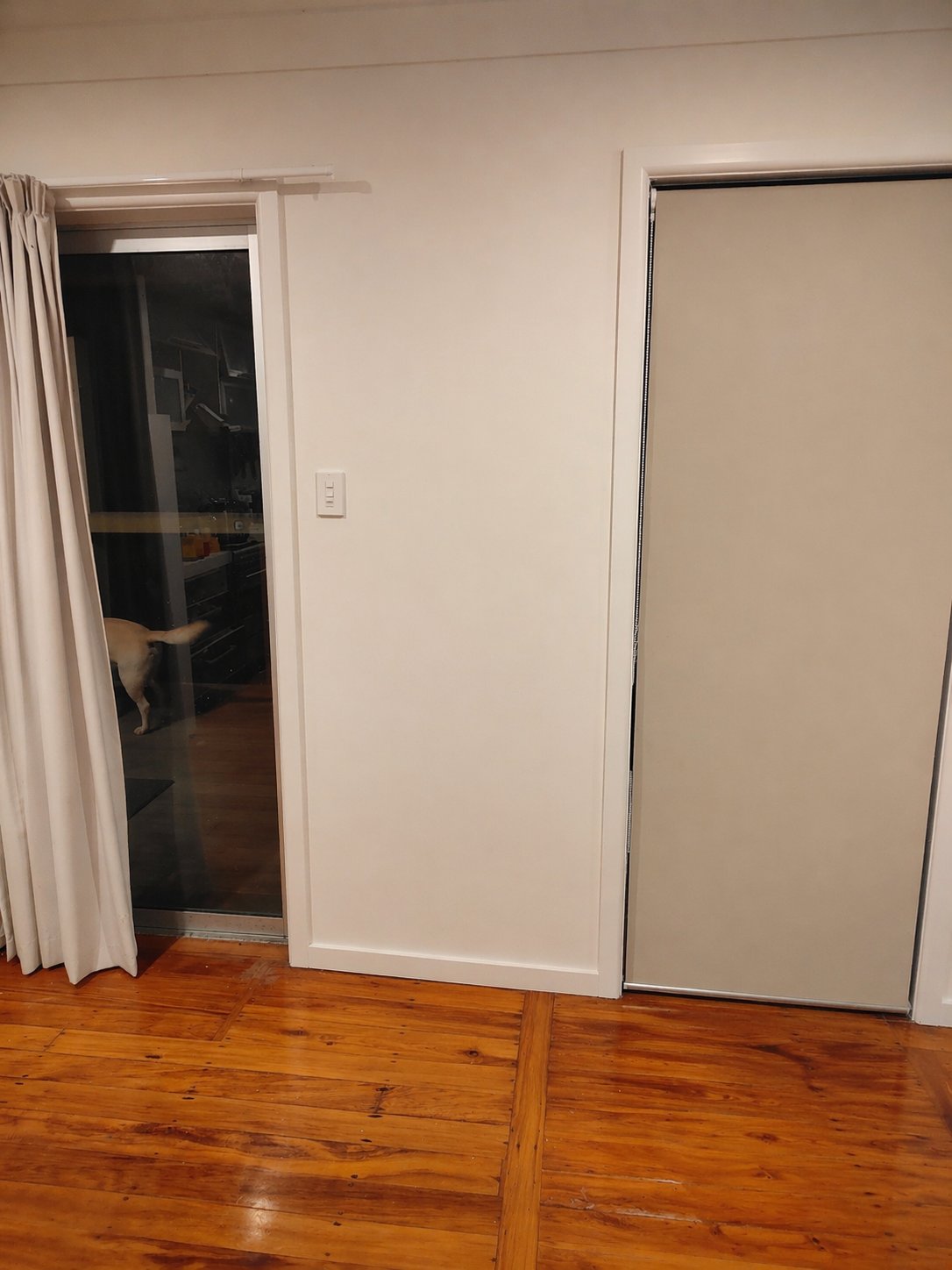 Empty wall before cabinet assembly